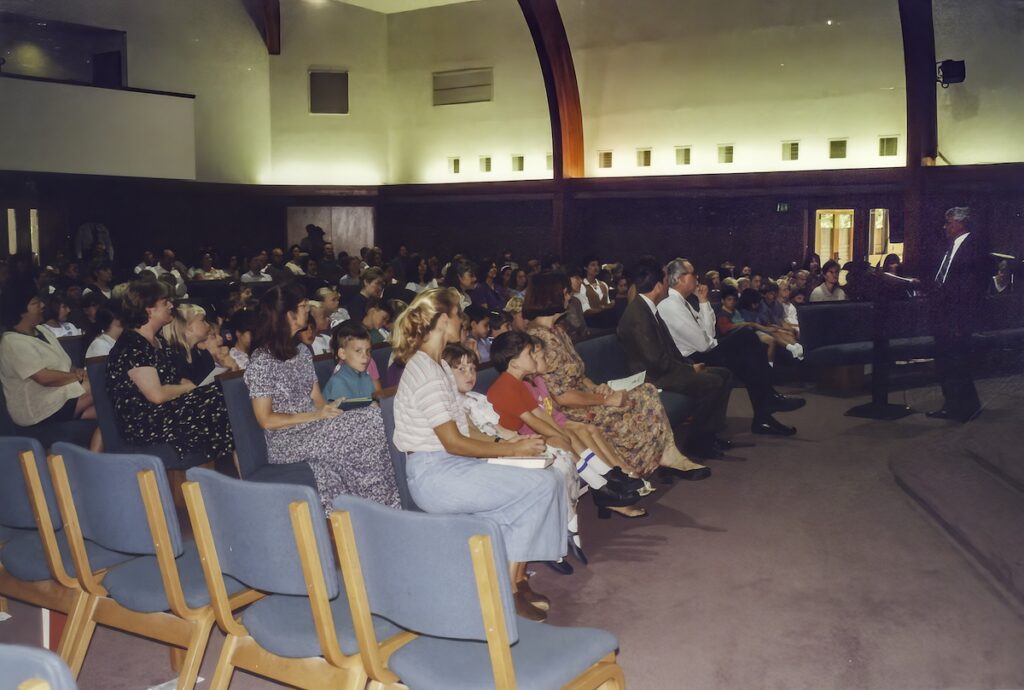 Founding Pastor P.G. Mathew addresses teachers, students, and families on the opening day of GVCA.