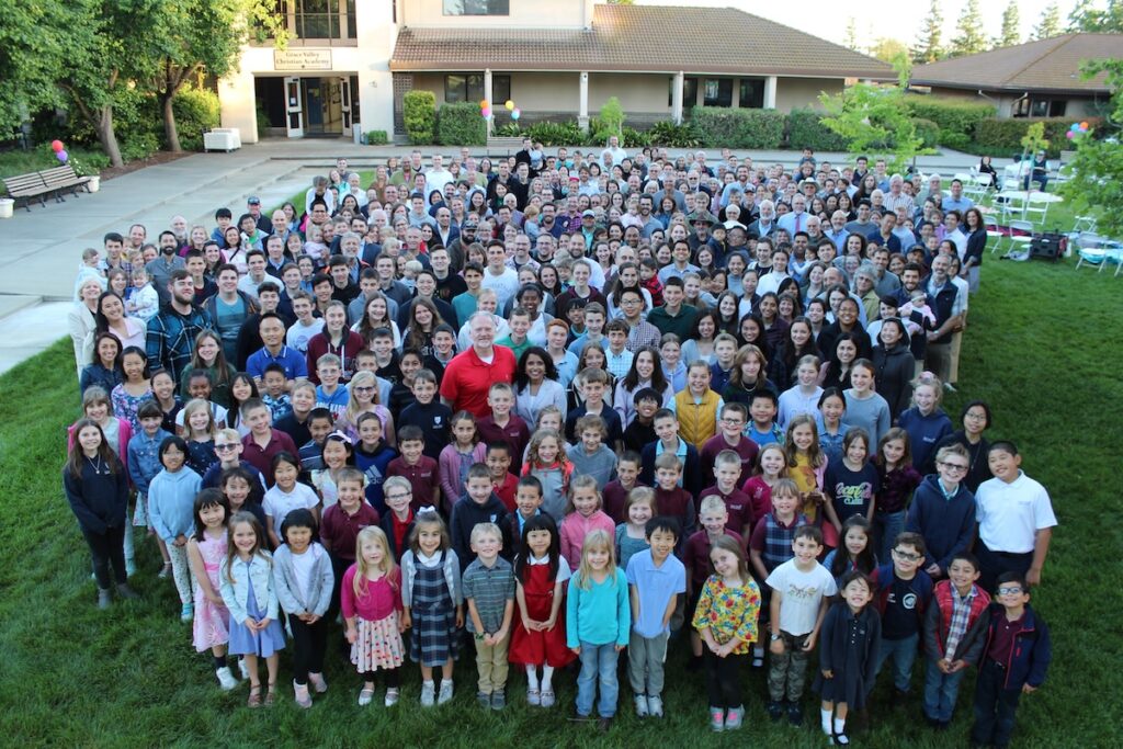 Pastor Broderick and Principal Broderick celebrate 25 years of GVCA with all students and families.